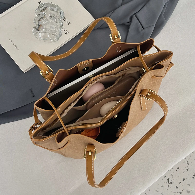 Sac fourre-tout de luxe à pomp - Leatherwork Designs avis et prix